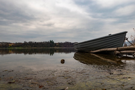Rowing boat on the lakeside of Lake Pusianoの写真素材