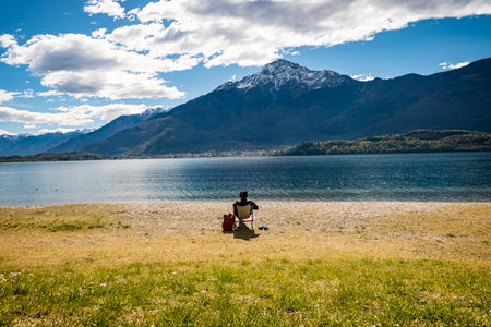 Relaxation scene on a beach of Lake Comoの写真素材