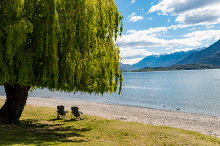 Relaxation scene on a beach of Lake Comoの写真素材