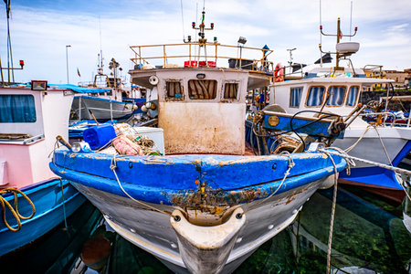 Fishing boat in a dock of sicilyの写真素材