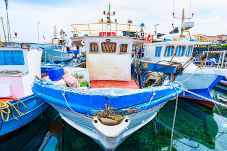 Fishing boat in a dock of sicilyの写真素材