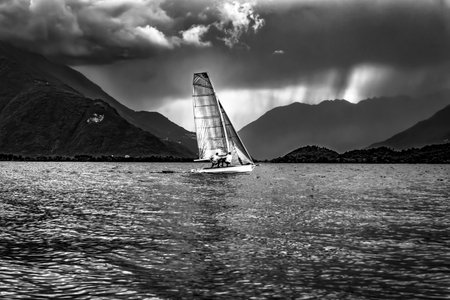 Sailing scene in a storm on Lake Comoの写真素材