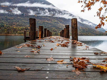 Wood pier on Lake Piano in autumnの写真素材