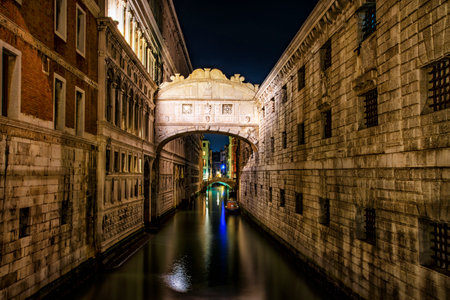Night scene in a canal of Veniceの写真素材