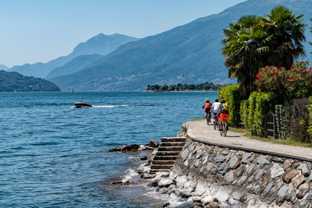Cycling scene on Lake Como waterfrontの写真素材