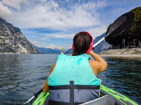 Visiting Lake Como on a canoeの写真素材