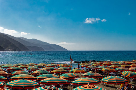 Beach umbrellas on an italian beach in Monterossoの写真素材