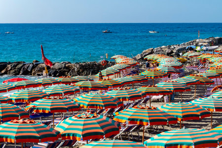 Beach umbrellas on an italian beach in Monterossoの写真素材