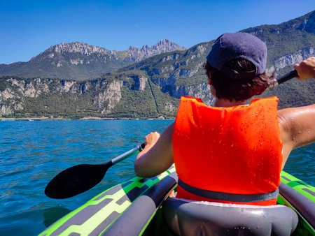Visiting Lake Como on a canoeの写真素材