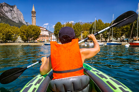 Visiting Lake Como on a canoeの写真素材