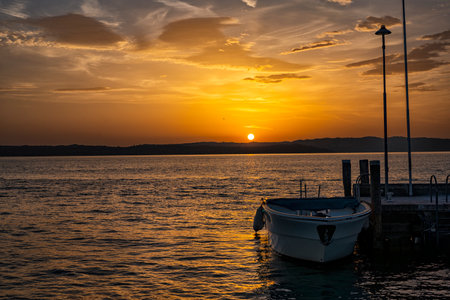 Sunset scene in Sirmione Town on Lake Gardaの写真素材