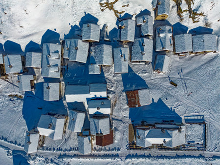 Snowy roofs in an alpine villageの写真素材