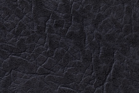 Black leather texture background with pattern, closeup.の写真素材
