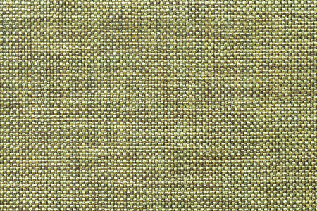 Light green background with checkered pattern, closeup. Structure of the olive fabric with natural texture. Cloth backdrop.の写真素材