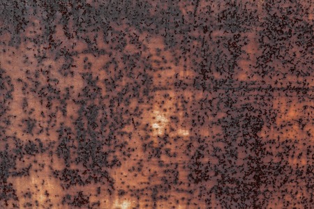 Dark brown worn rusty metal texture background. Old grunge steel surface. Vintage effect.