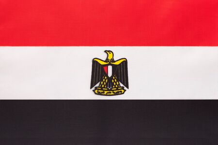 Egypt national fabric flag, textile background. Symbol of international african world country. Egyptian state official sign.の写真素材