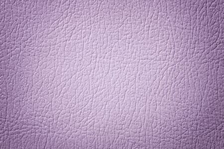 Light purple leather texture background, closeup. Violet cracked backdrop from wrinkle skin, structure of lilac textile with vignette.の写真素材