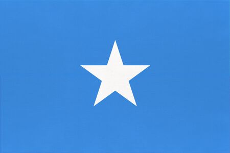Somalia national fabric flag, textile background. Symbol of international world african country. State official somalian sign.の写真素材