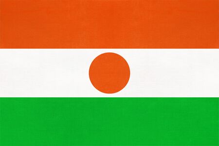 Republic Niger national fabric flag textile background. Symbol of international world african country. State official africa sign.の写真素材