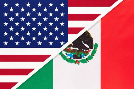 USA vs Mexico national flag from textile. Relationship, partnership and economic between two north american countries.の写真素材