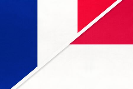French Republic or France and Monaco, symbol of national flags from textile. Relationship, partnership and championship between two european countries.の写真素材