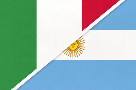 Italy or Italian Republic and Argentina or Argentine Republic, symbol of two national flags from textile. Relationship, partnership and championship between American and European countries.の写真素材