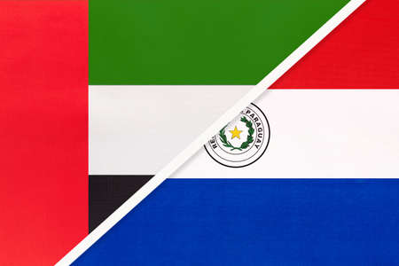 United Arab Emirates or UAE and Paraguay, symbol of two national flags from textile. Relationship, partnership and championship between American and Asian countries.の写真素材