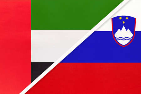 United Arab Emirates or UAE and Slovenia, symbol of two national flags from textile. Relationship, partnership and championship between European and Asian countries.の写真素材