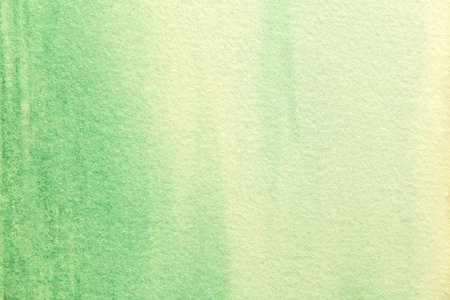 Abstract art background dark green and yellow colors. Watercolor painting on canvas with soft olive gradient. Fragment of artwork on paper with pattern. Texture backdrop.の写真素材