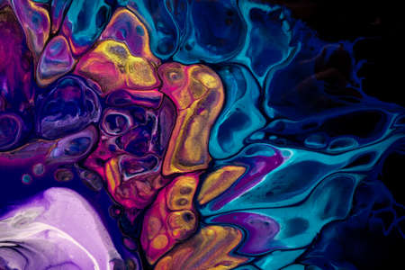 Bright abstract fluid art on black background dark purple and blue colors. Liquid acrylic painting...