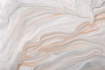 Abstract fluid art background light brown and white colors. Liquid marble. Acrylic painting with...