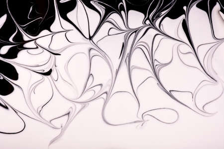 Abstract fluid art background black and white colors. Liquid marble. Acrylic painting on canvas with...