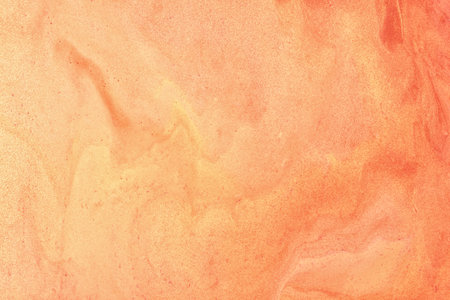 Abstract fluid art background coral colors. Liquid marble. Acrylic painting on canvas with orange shiny gradient. Alcohol ink backdrop with pearl peach wavy pattern.の写真素材