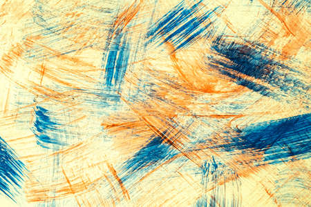 Abstract art background blue and beige colors. Watercolor painting on canvas with orange color strokes and splash. Acrylic artwork on paper with spotted pattern. Texture backdrop.の写真素材