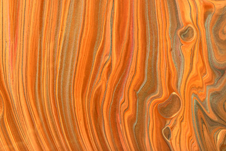 Abstract fluid art background dark orange and silver glitter colors. Liquid marble. Acrylic painting on canvas with red gradient. Watercolor backdrop with red wavy pattern. Stone section.の写真素材