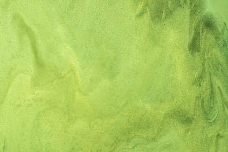 Abstract fluid art background light green colors. Liquid marble. Acrylic painting on canvas with...