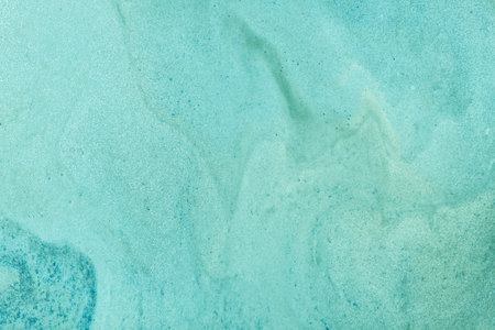 Abstract fluid art background light blue colors. Liquid marble. Acrylic painting on canvas with...
