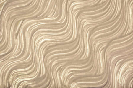 Abstract art background light brown and beige colors. Watercolor painting on canvas with sand strokes and splashes. Acrylic artwork on paper with brushstroke wavy pattern. texture backdrop.の写真素材