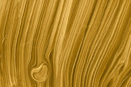 Abstract fluid art background gold glitter colors. liquid marble. Acrylic painting on canvas with...