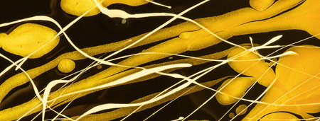 Abstract fluid art background black and golden colors. liquid marble. Acrylic painting on canvas...