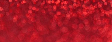 Blurred bright red sparkling background from small sequins, macro. Brilliant and diamond ruby...