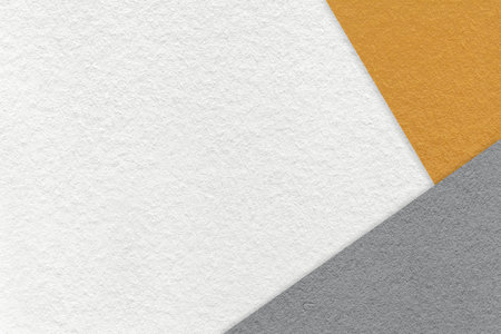 Texture of craft white color paper background with dark orange and gray border. Vintage abstract cardboard. Presentation template and mockup with copy space. Felt backdrop closeup.の写真素材