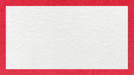 Textured white paper background with red border. Vintage cardboard with frame and copy space for banner, presentation.の写真素材