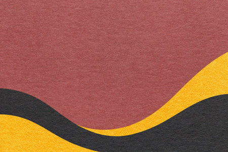 Textured maroon paper background with black and yellow wavy lines and waves, copy space for banner, presentation.の写真素材