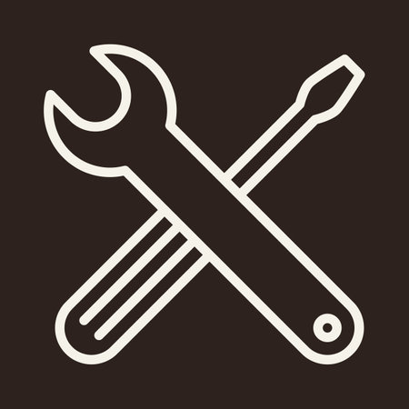 Wrench and screwdriver. Tools icon on dark backgroundのイラスト素材