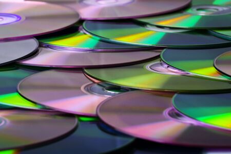 A lot of compact disks - backgroundの写真素材
