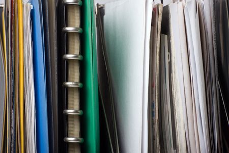 A lot of papers, documents and file folders