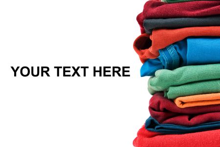 Stack of color clothes stored in rows
