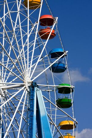 A Ferris wheel on a blue sky backgroundの写真素材