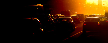 Urban traffic jam at the evening, sunlightの写真素材